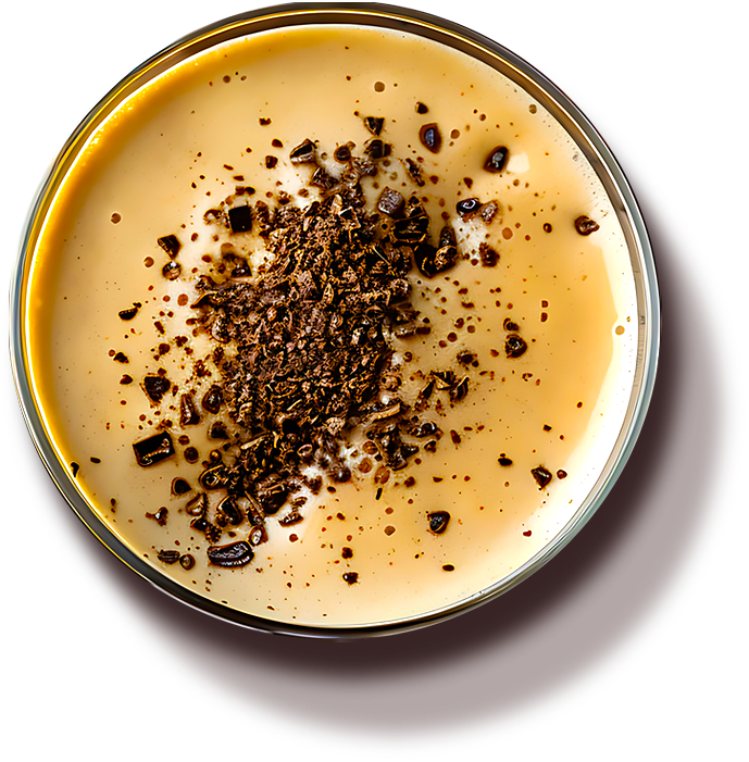 A creamy coffee finished with shaved chocolate